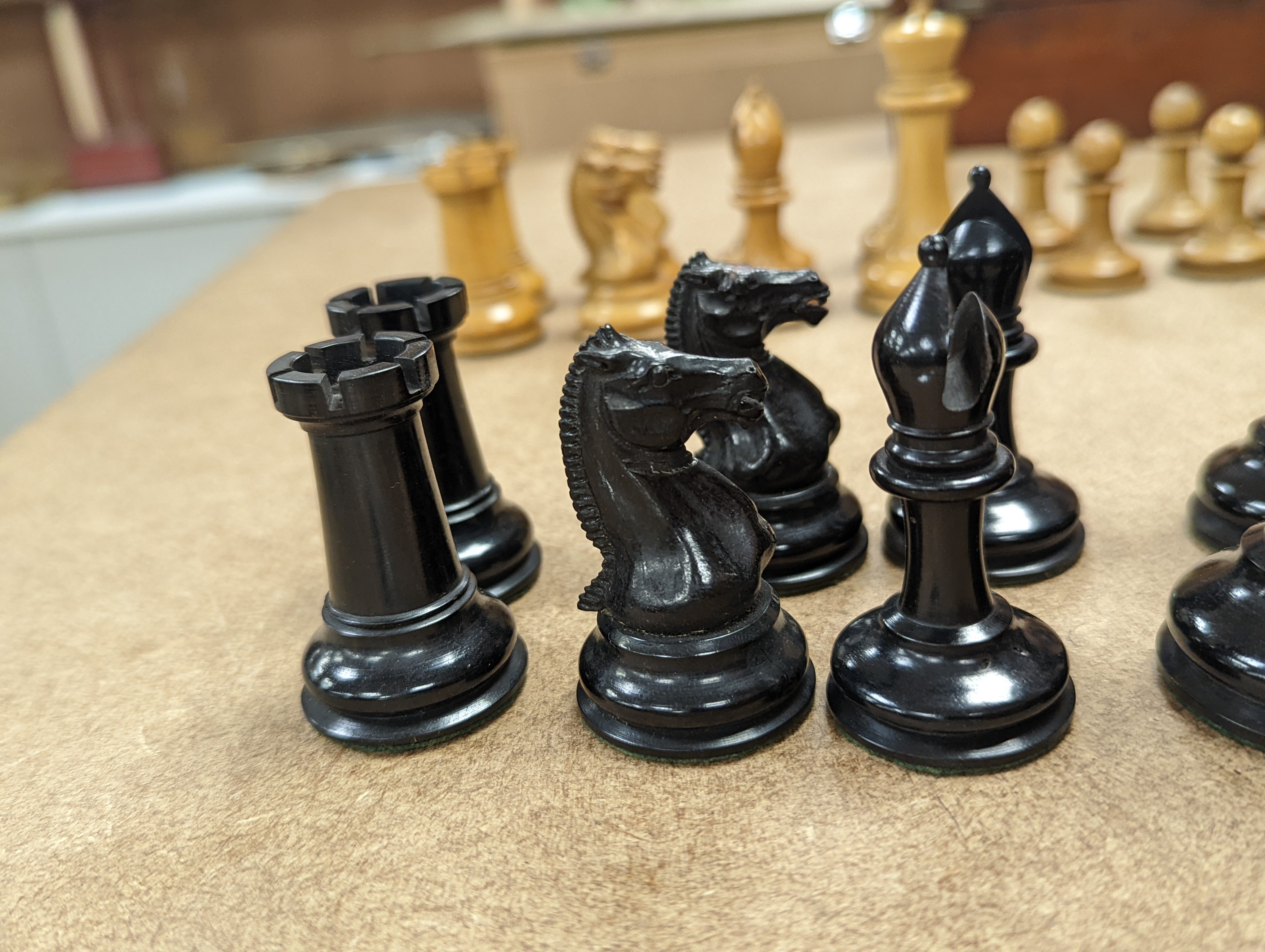 A boxed Jaques Staunton boxwood and ebony chess set, White king stamped Jaques London, 8.5cm high